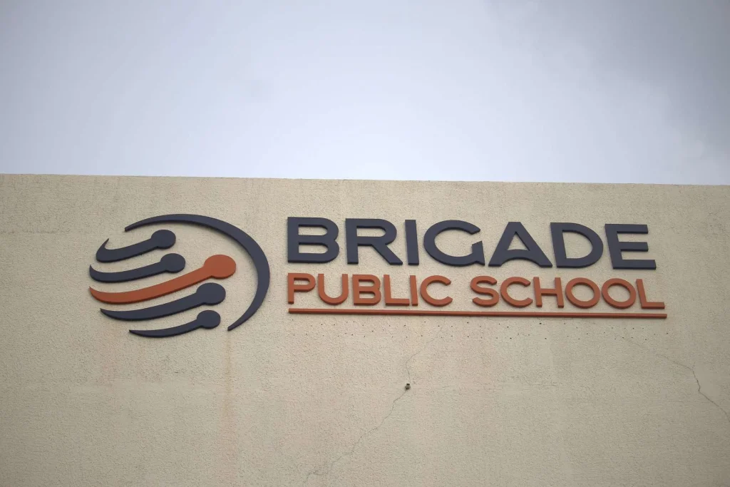 School building facade with logo at Brigade Public School, Gurramguda campus