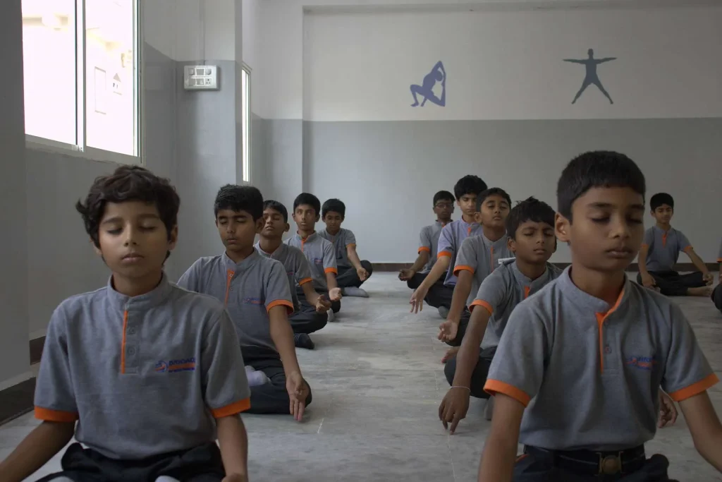 Boys practising meditation at Brigade Public School, Gurramguda campus